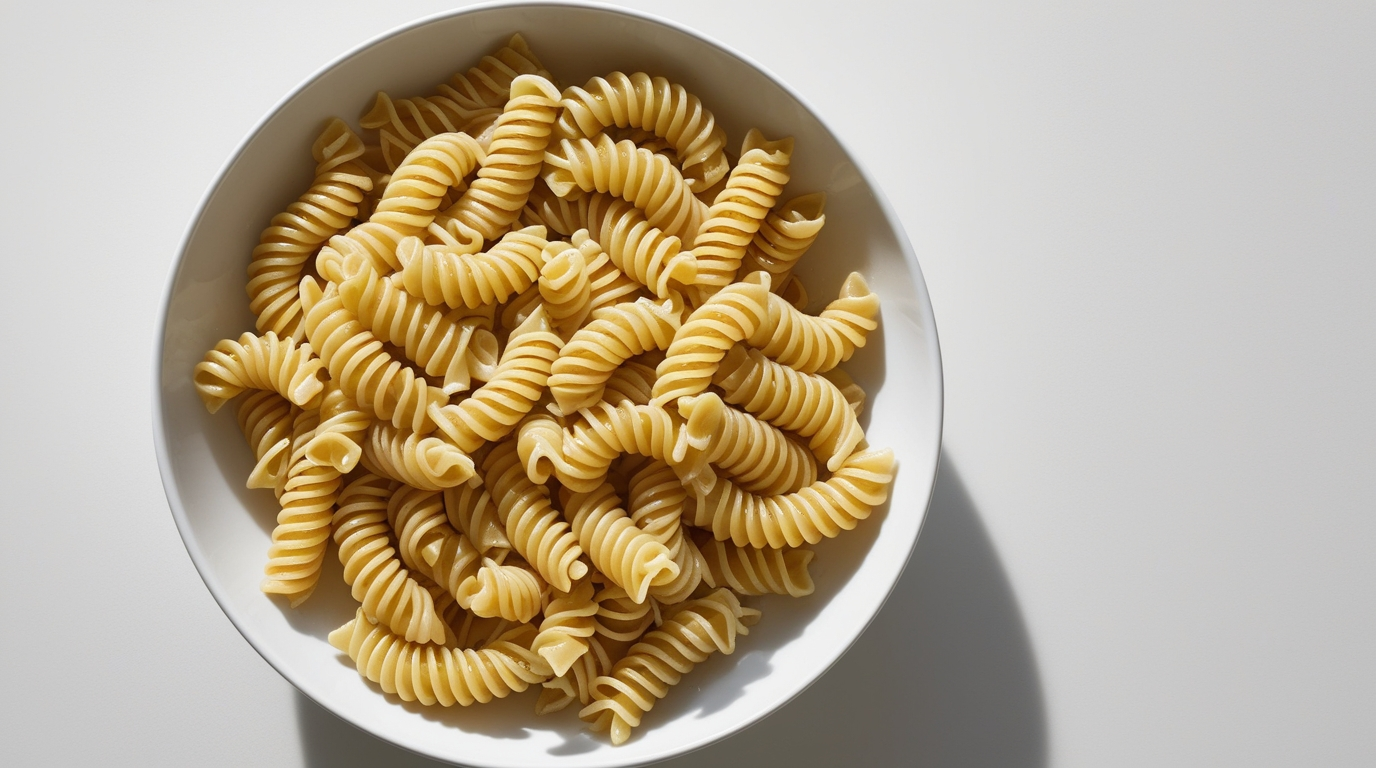 Close-up of cooked fusilli pasta.